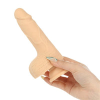 A 6 1/2" Thrusting Dildo That Is Harness Compatible